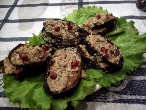 Badrijani (nigvzit--with nuts): marinaded eggplant topped with walnut sauce 