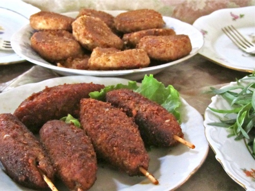 Katleti ("cutlet"): may be Georgian-style (beef/pork with herbs and onions) or Kiev-style (chicken stuffed with butter and cheese). There are many variations using different herbs and other ingredients like bread crumbs or potatoes. 