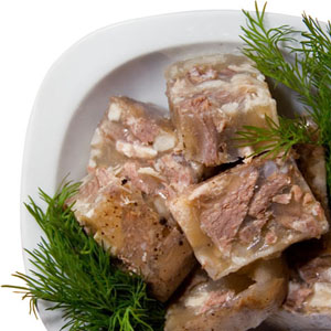 Muzhuzhi: pork offal (feet, ears, and tail) marinaded in vinegar and garlic
